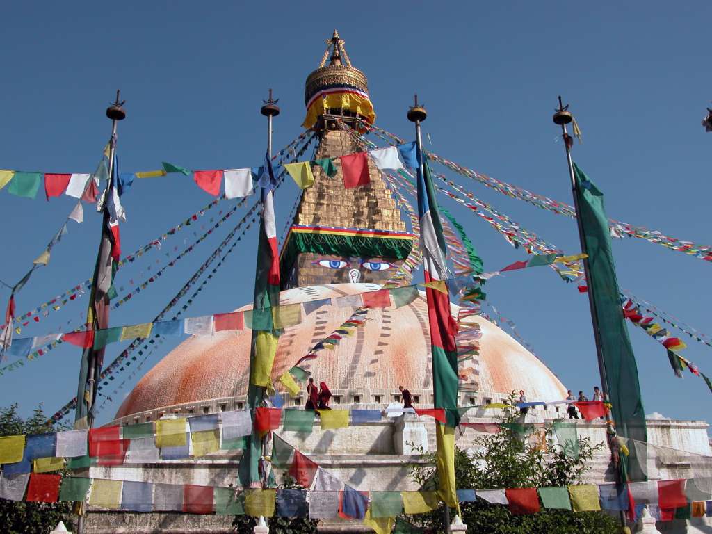 Manaslu 00 08 Kathmandu Boudhanath Kathmandus 36m-high Boudhanath Stupa is the largest stupa in Nepal, and one of the largest in the world. It is a religious centre for Nepal's considerable population of Tibetans. It supposedly dates from 5C AD. With three square tiers surrounding the central circle of the dome, Boudhanath is built in the form of a mandala, a symbol of the universe that is often used in Buddhist meditations.